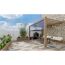 Gepflasterte Terrasse mit Überdachung, Esstisch und Feuerstelle