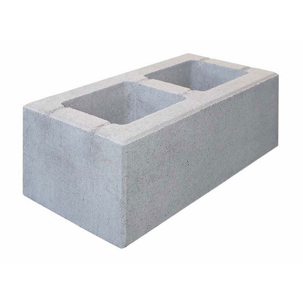 Grauer Betonstein mit zwei Löchern