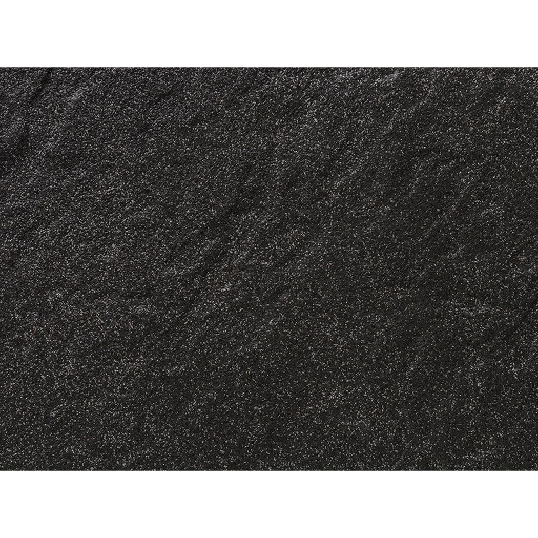 Schwarze, körnige Fläche
