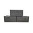 Drei graue T-Wall Schalungssteine