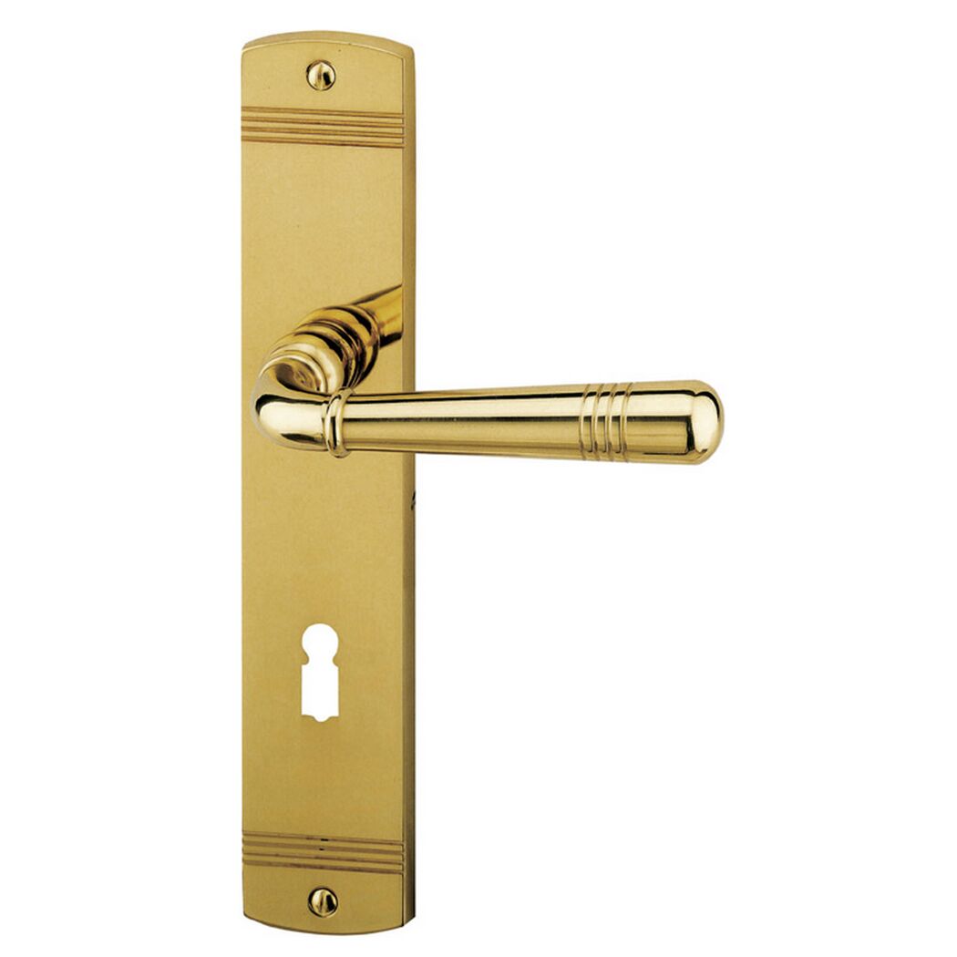Goldene Türklinke mit Langschild und Schlüsselöffnung.