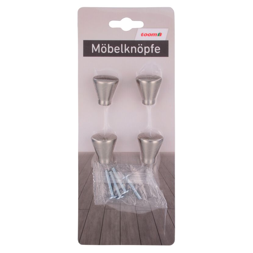 Vier Möbelknöpfe und Schrauben in Verpackung.