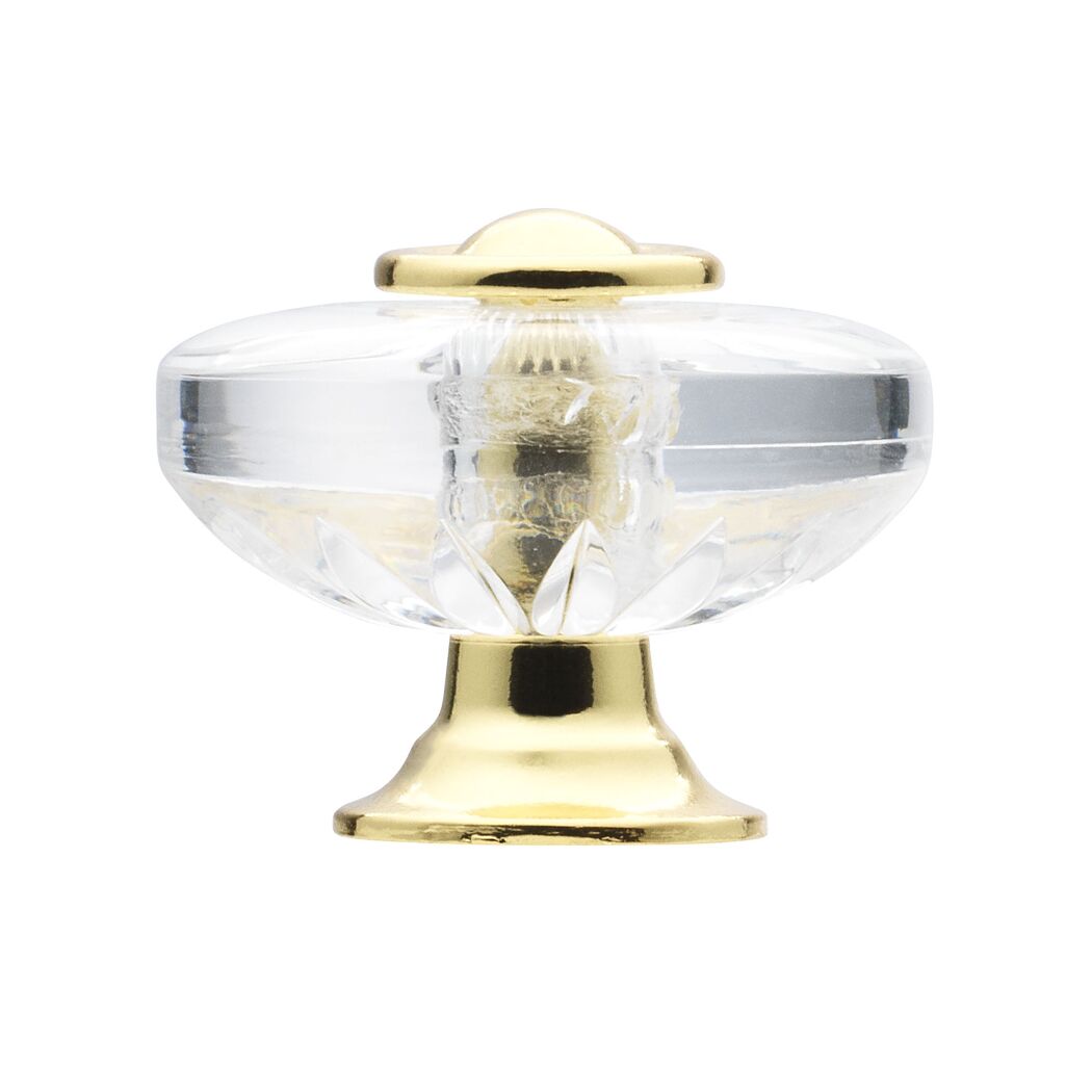 Klarer Möbelknopf mit goldenem Sockel