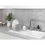 Geschirr im Abtropfgestell neben dem Spülbecken