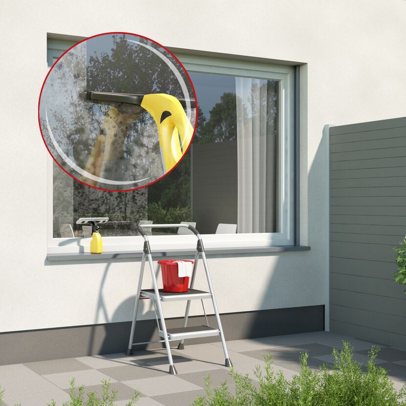 Fensterreinigung mit Fenstersauger und Eimer