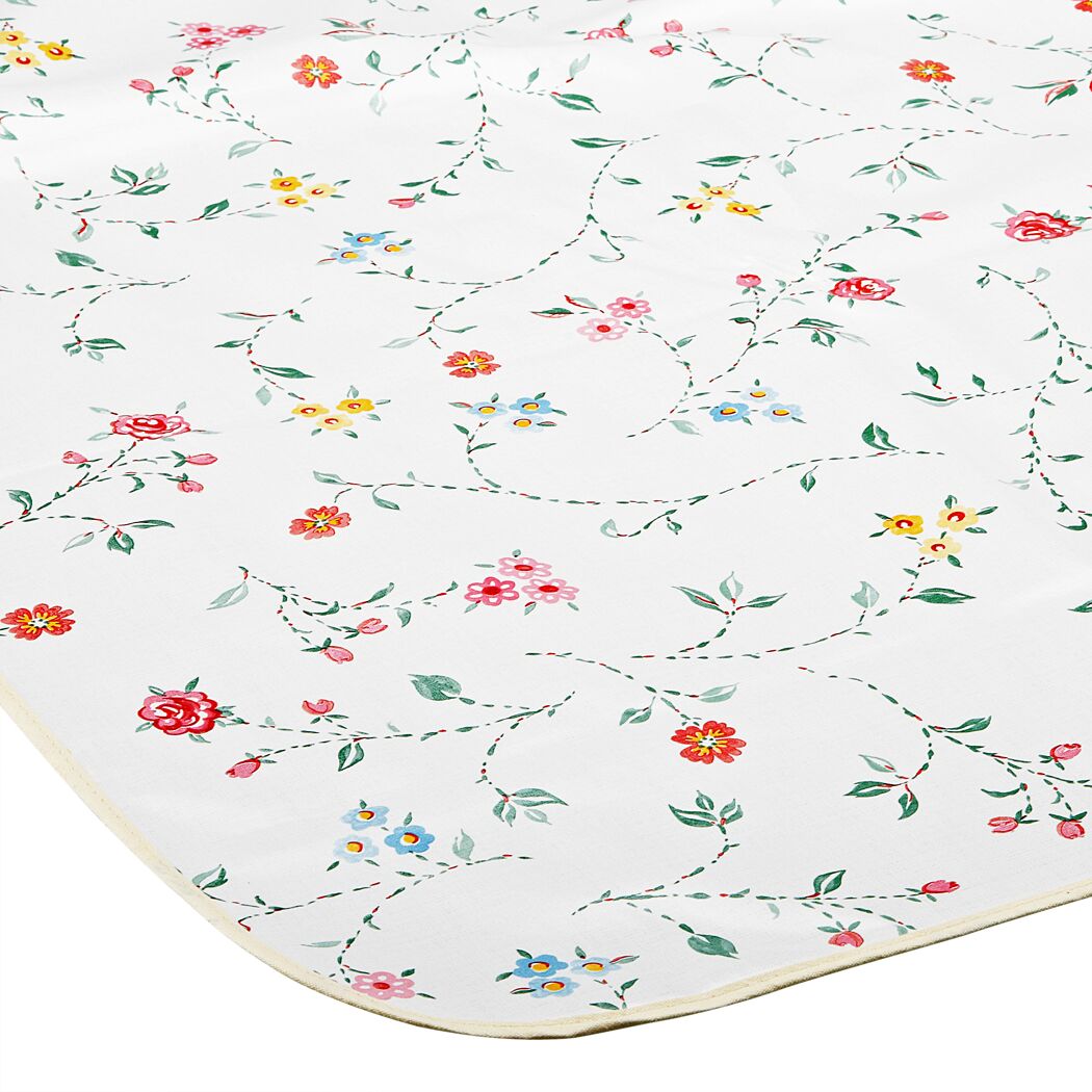 Weiße Tischdecke mit buntem Blumenmuster