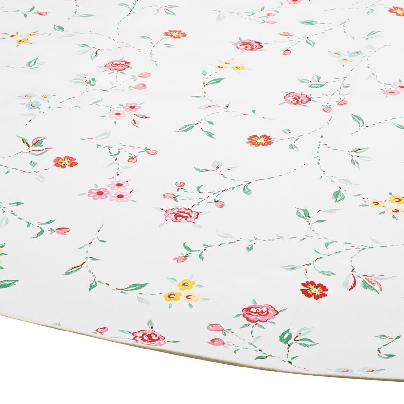 Weiße Tischdecke mit buntem Blumenmuster