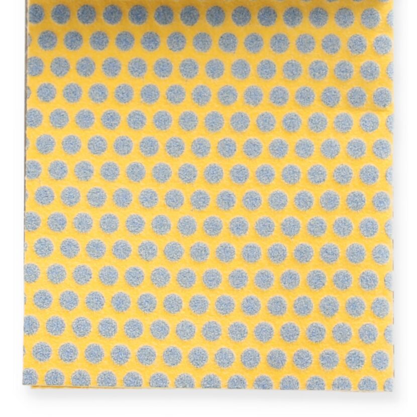 Gelbes Scheuertuch mit blauen Punkten