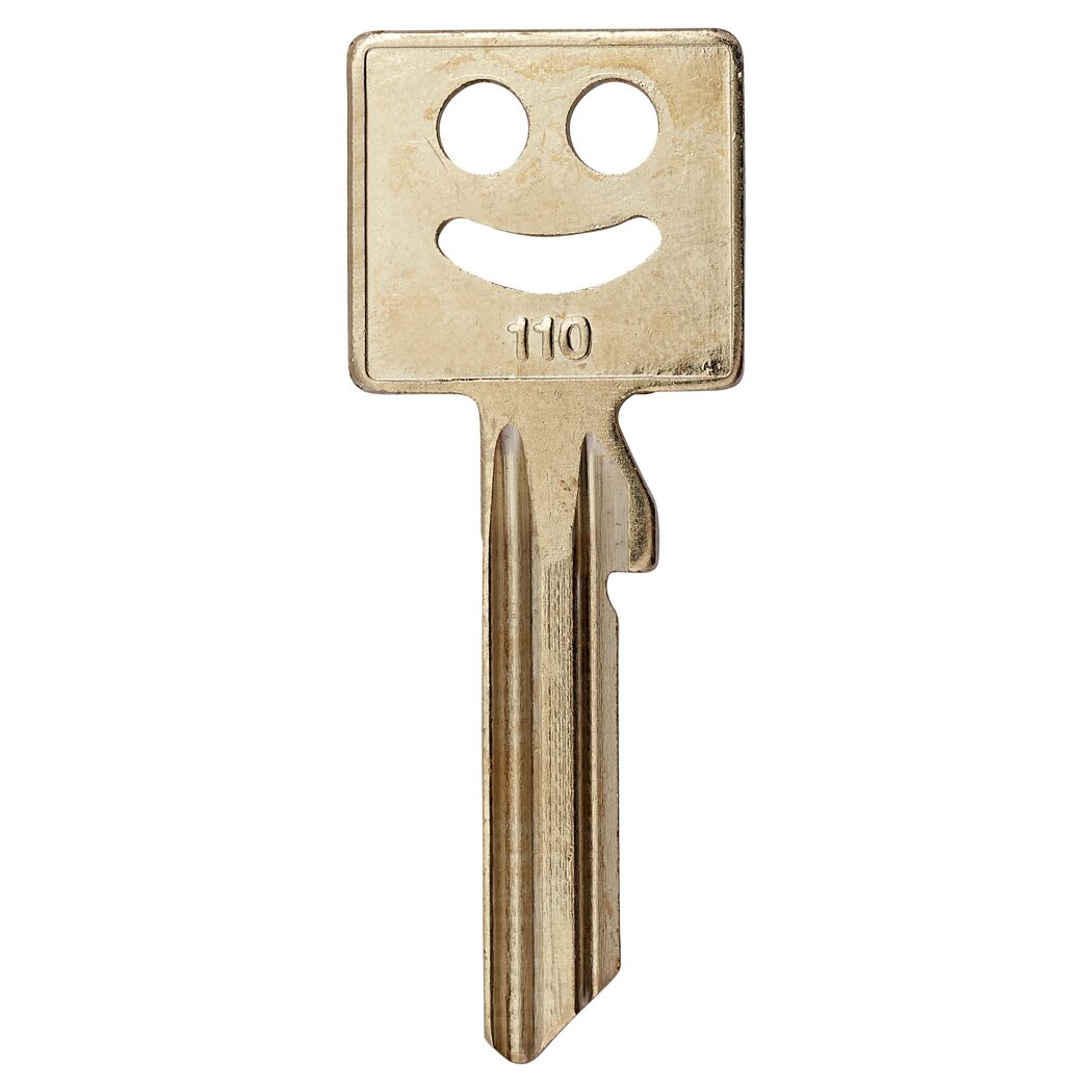 Schlüsselrohling mit Smiley-Gesicht und der Nummer 110.