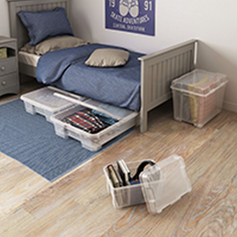 Aufbewahrungsboxen unter einem Bett