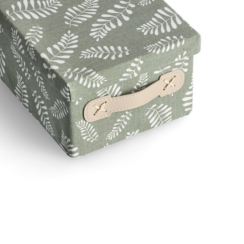 Grüne Aufbewahrungsbox mit Blätterdesign