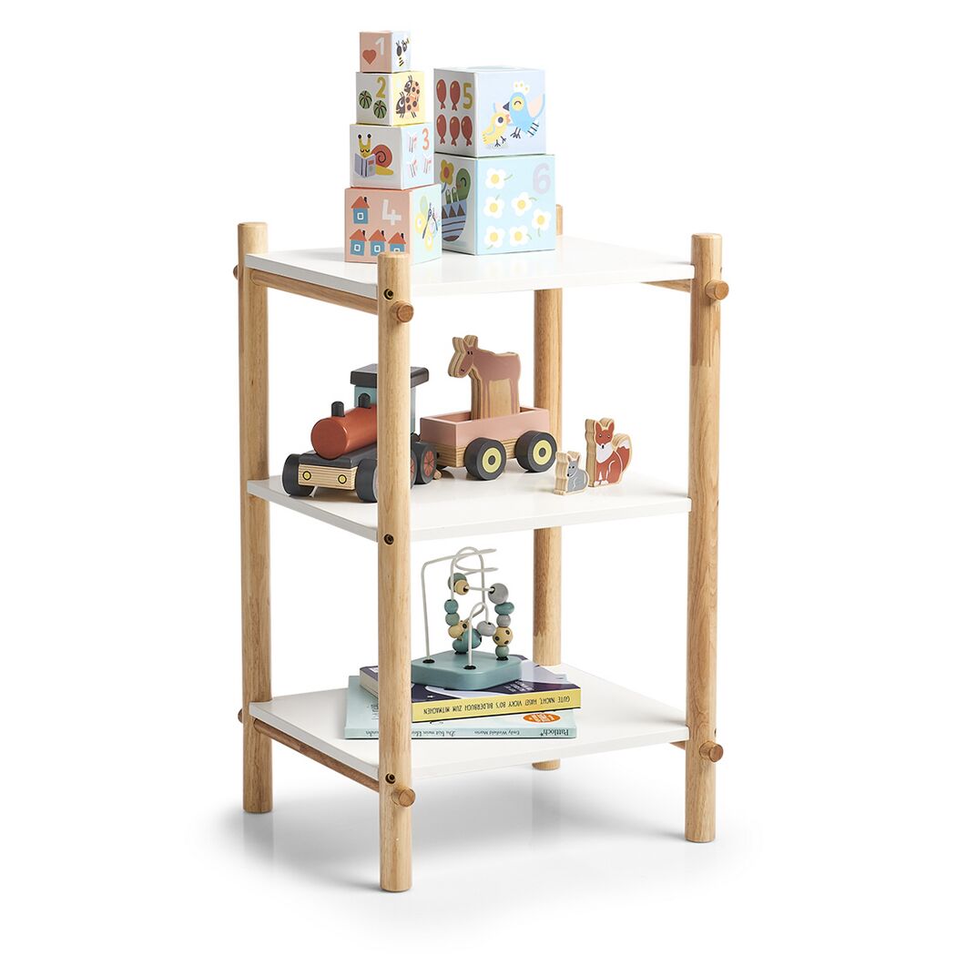 Weißes Kinderregal mit Spielzeug