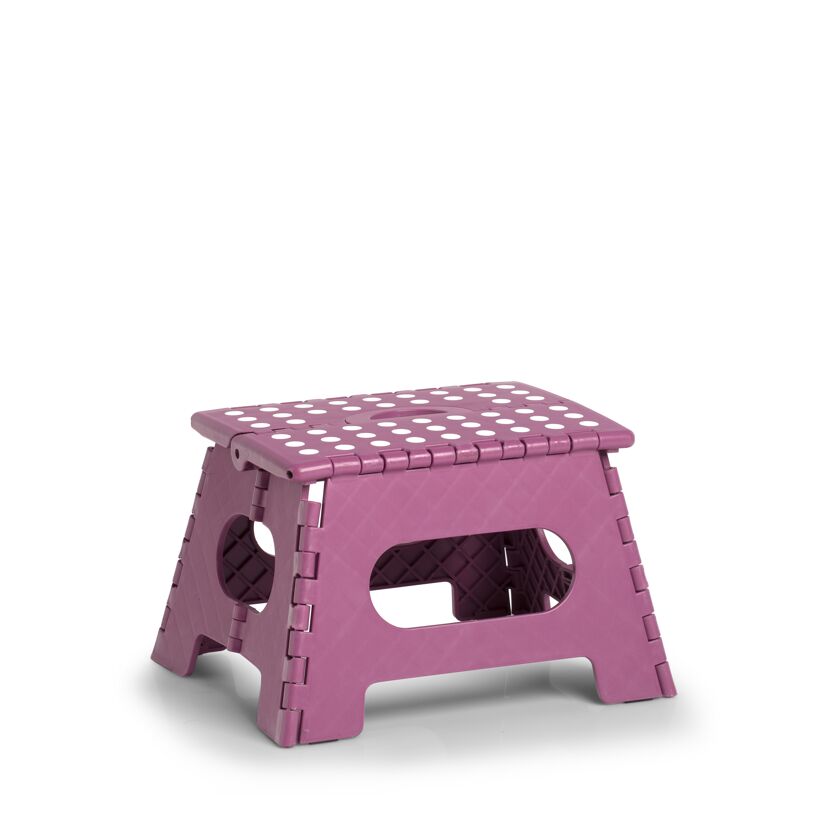Lila Klapphocker mit weißen Punkten