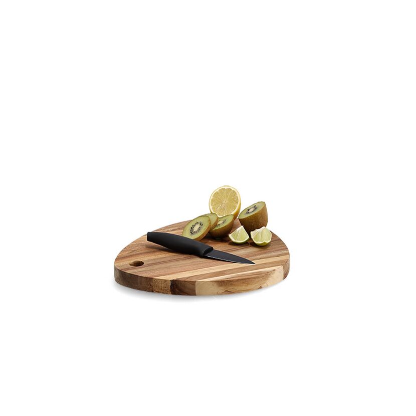 Obst und Messer auf Schneidebrett