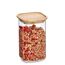 Glasbehälter mit Holzdeckel und Müsli