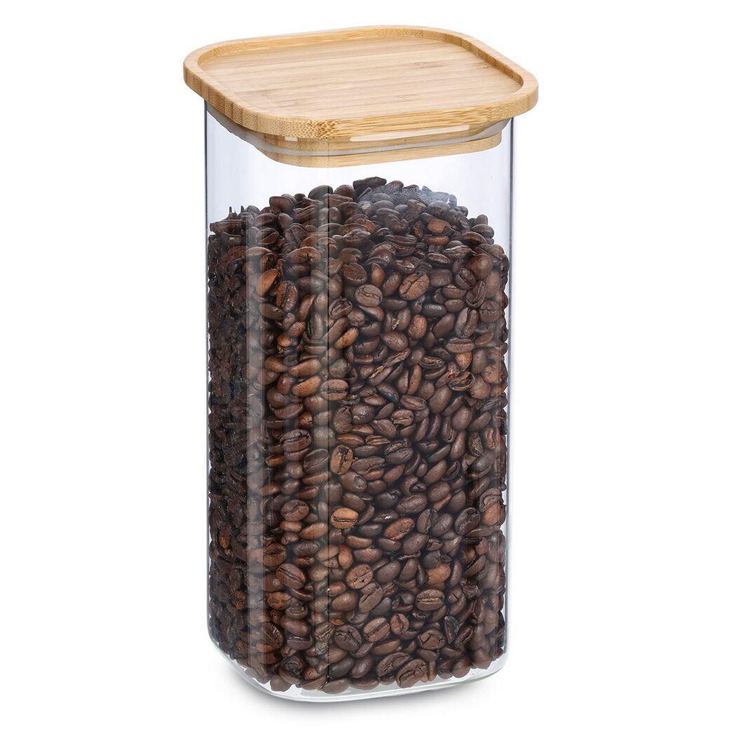 Glasbehälter mit Holzdeckel und Kaffeebohnen