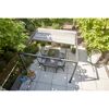 Pergola mit Esstisch und Stühlen auf einer Terrasse