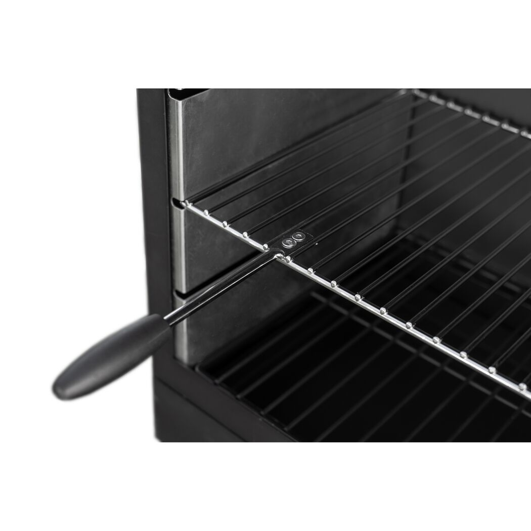 Grillrost und Griff eines schwarzen Grills