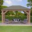 Holzpavillon Devon mit Gartenmöbeln auf einer Terrasse