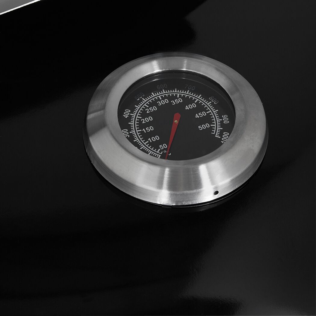 Ein Thermometer eines Kugelgrills