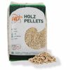 Sack mit HD+ Holzpellets und Pellets davor.