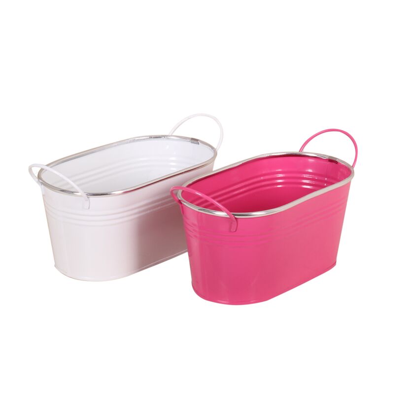 Zwei Zink Jardinieren, eine in weiß und eine in pink.
