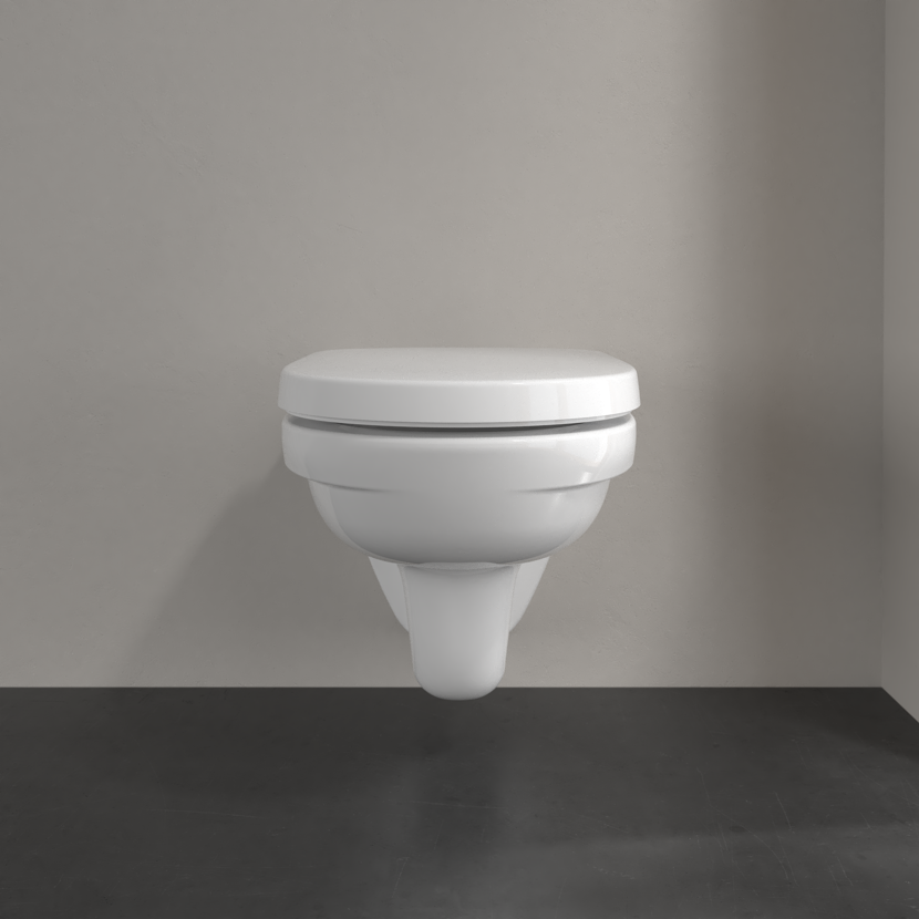 Hängendes, weißes WC mit geschlossenem Deckel.