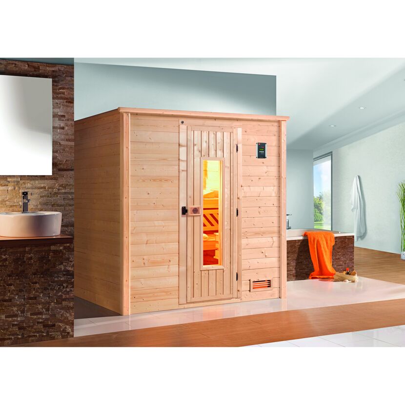 Sauna aus hellem Holz in einem Badezimmer