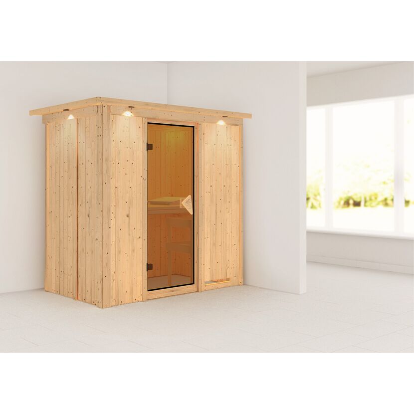 Sauna aus hellem Holz in einem hellen Raum