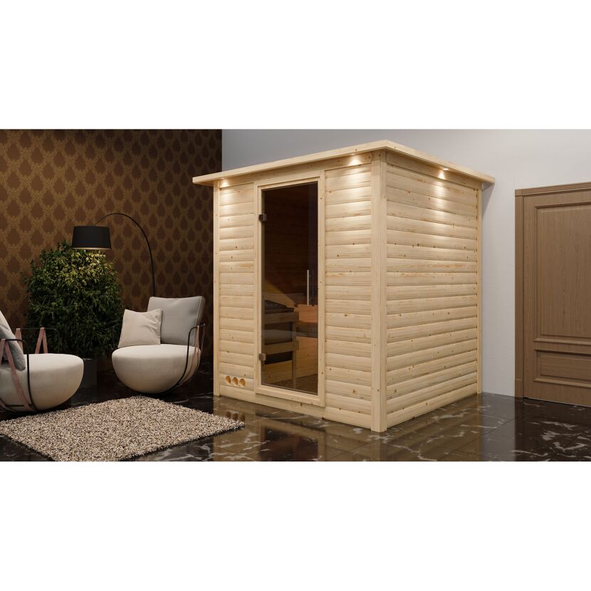 Sauna aus hellem Holz in einem Raum.