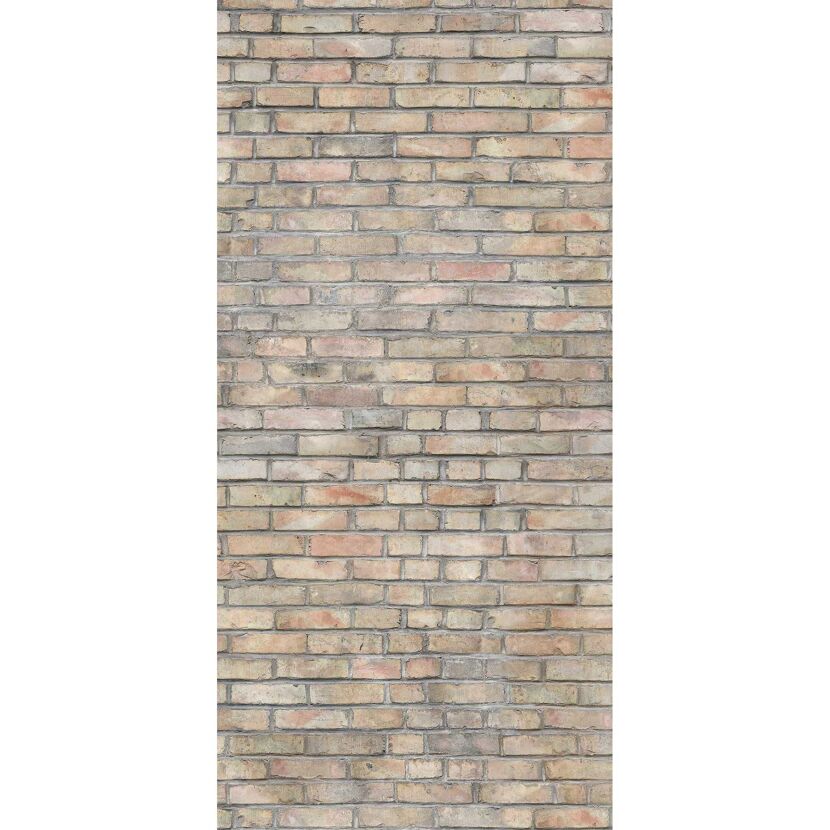 Nahaufnahme einer beigefarbenen Ziegelwand
