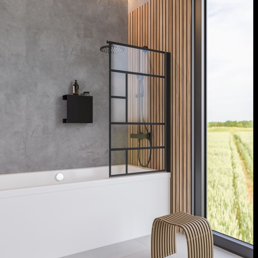 Badezimmer mit Badewanne und schwarzer Duschwand