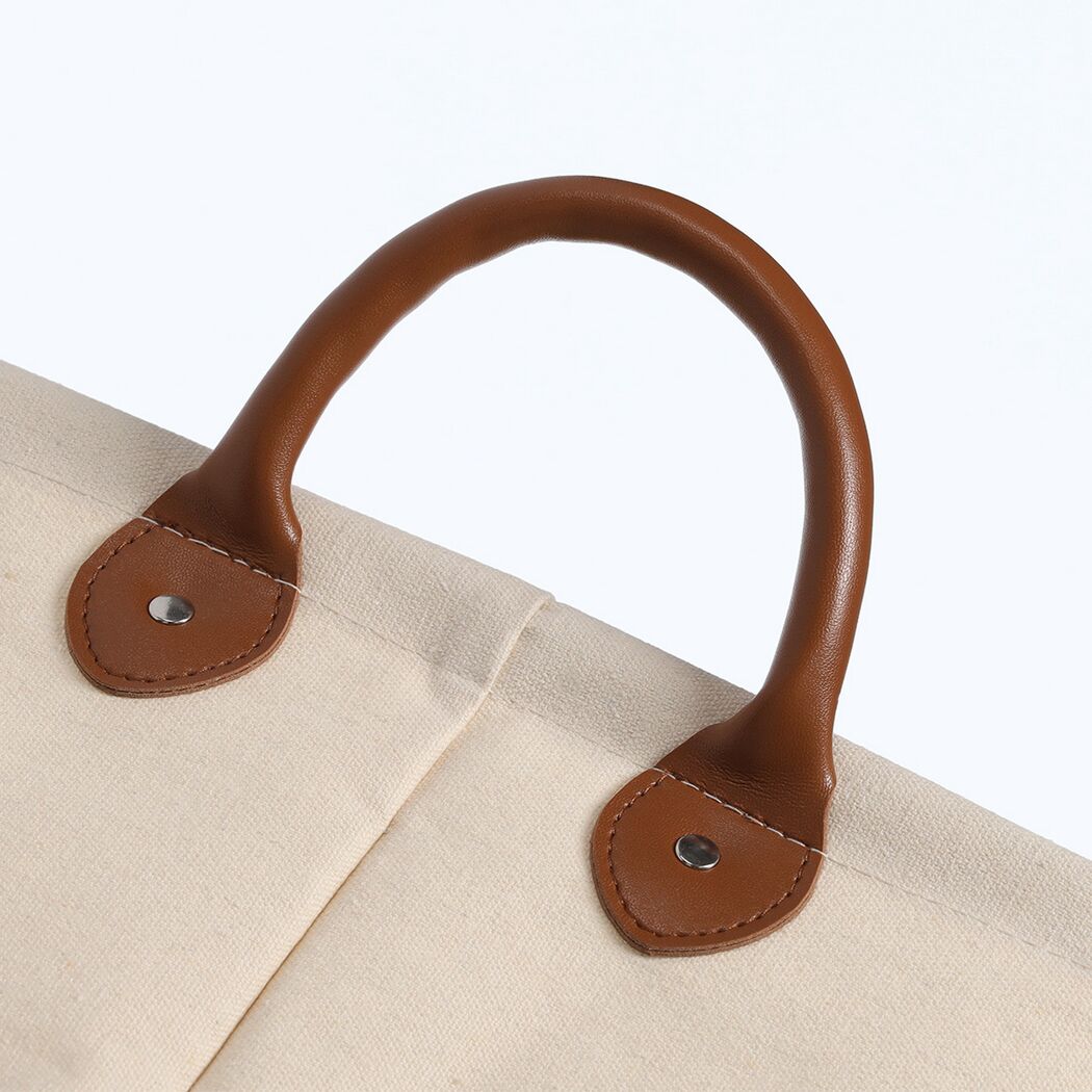 Brauner Tragegriff an Stofftasche