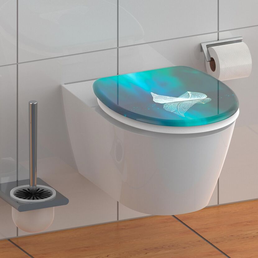 WC-Sitz mit türkis-blauem Blattmotiv
