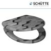 Schwarzer WC-Sitz mit Wabenmuster.