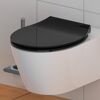 Schwarzer WC-Sitz auf weißer Toilette