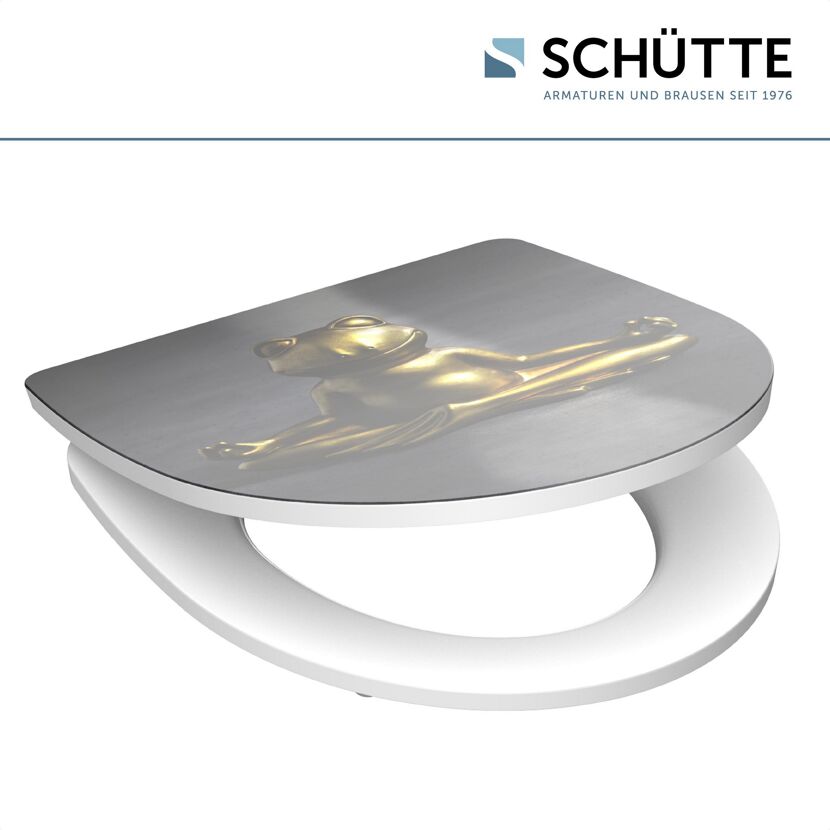 WC-Sitz mit goldenem meditierendem Frosch