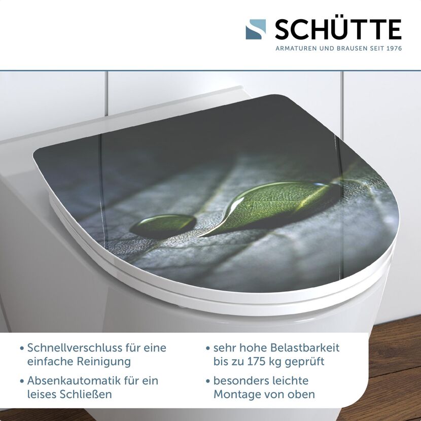 WC-Sitz mit Blattmuster und Wassertropfen
