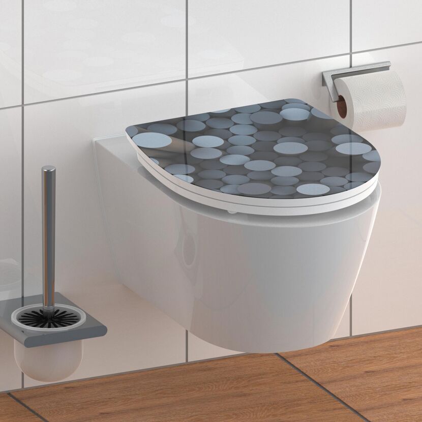WC-Sitz mit rundem, blau-grauem Muster