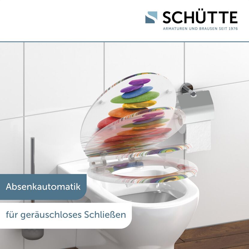 WC-Sitz mit bunnten Steinen und Absenkautomatik.