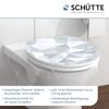 WC-Sitz mit grau-weißem geometrischem Muster
