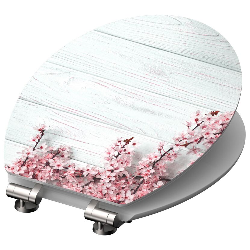 WC-Sitz mit Kirschblüten auf hellem Holz