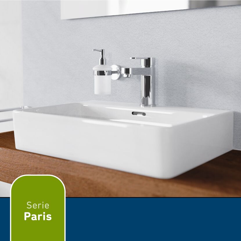 Waschbecken mit Seifenspender und Wasserhahn