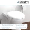 Weißer WC-Sitz auf einer Toilette.