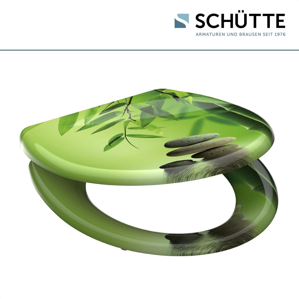 Grüner WC-Sitz mit Bambusmotiv.