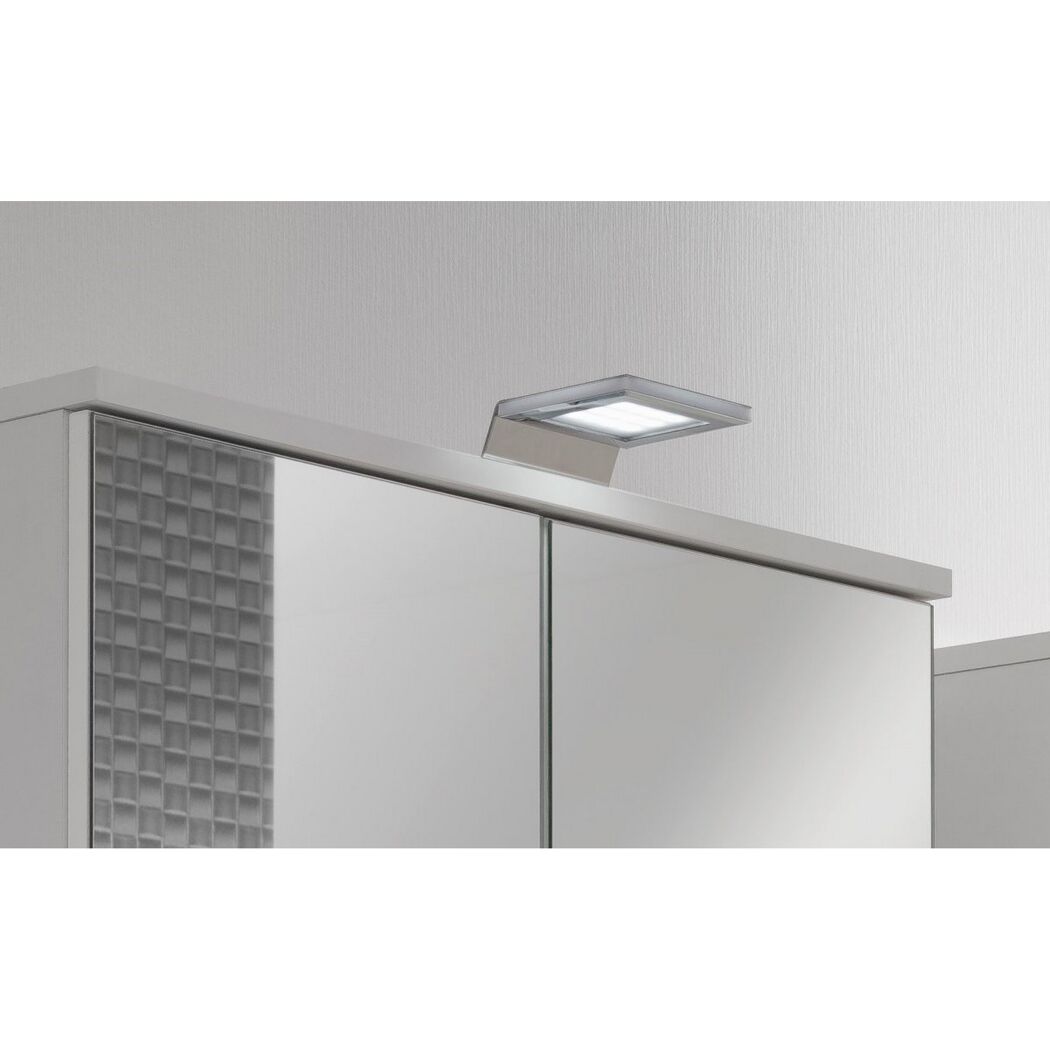 Weißer Spiegelschrank mit LED-Beleuchtung.