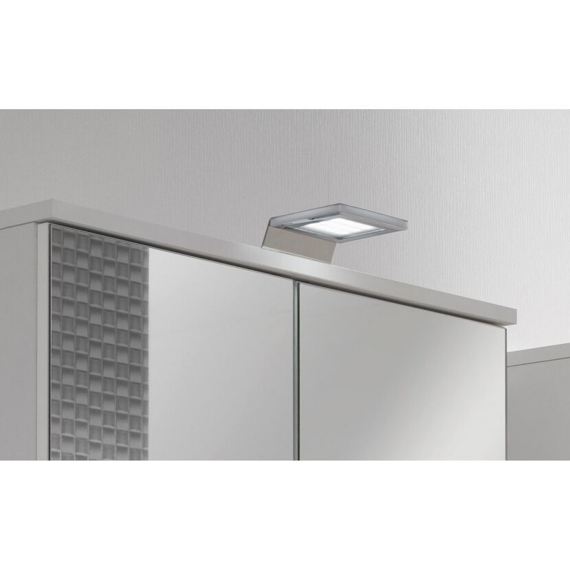 Weißer Spiegelschrank mit LED-Beleuchtung.