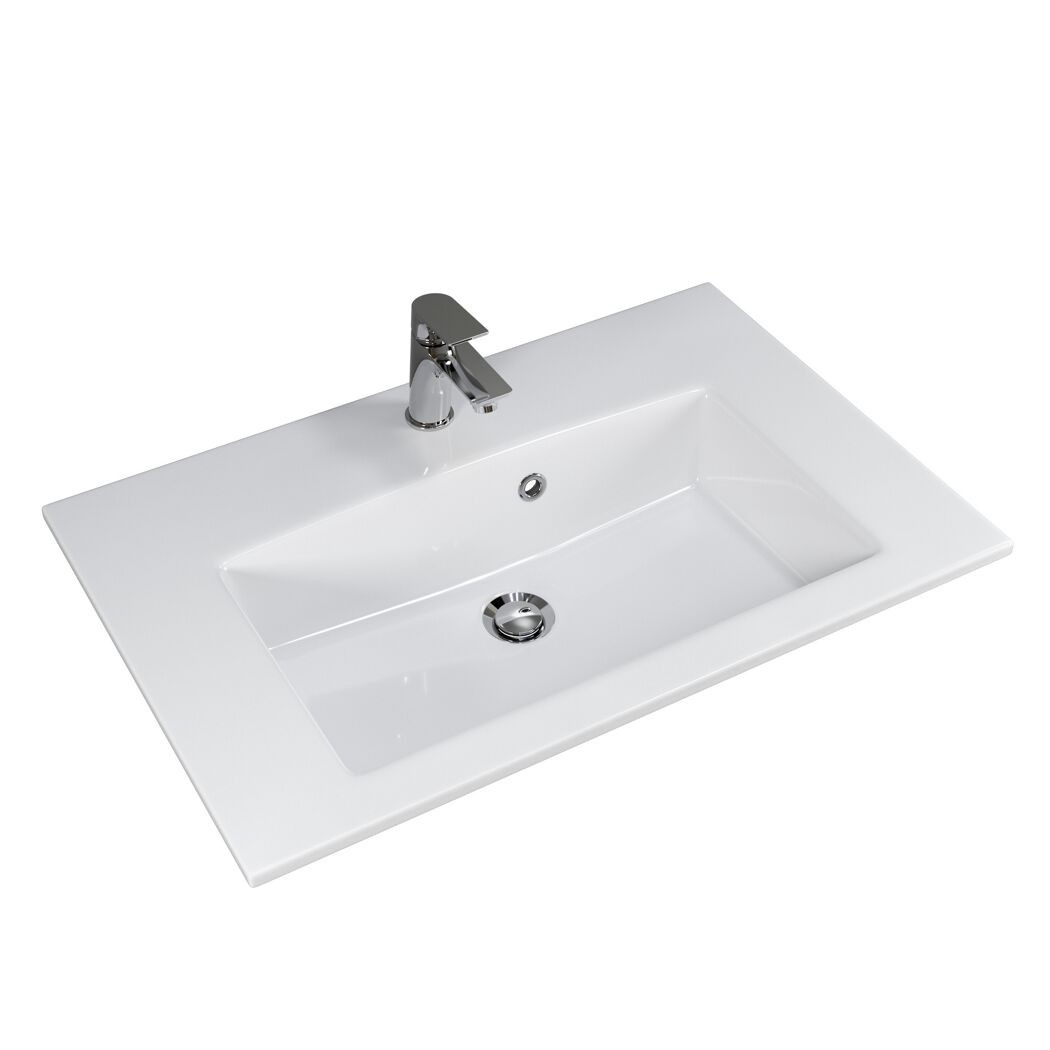 Weißes Waschbecken mit Wasserhahn und Abfluss.