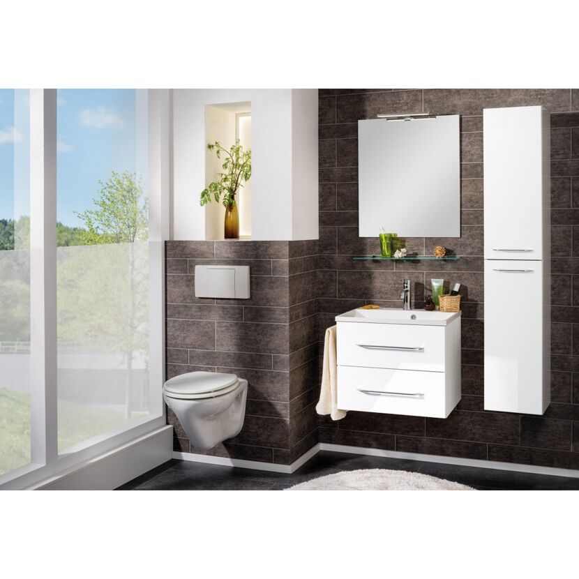 Modernes Badezimmer mit weißem Waschbecken und WC.