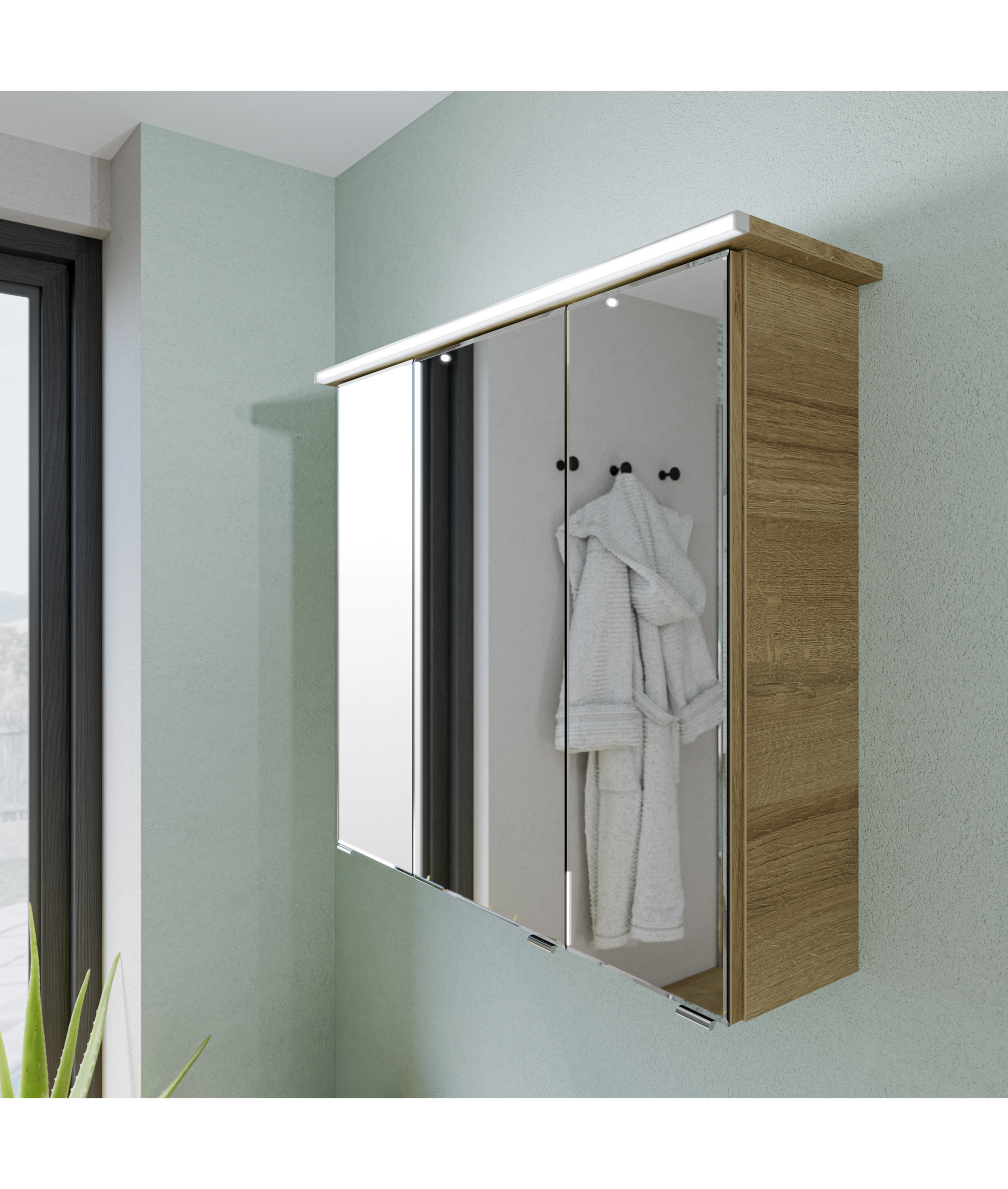 Badezimmerspiegel mit LED-Beleuchtung und Handtuch
